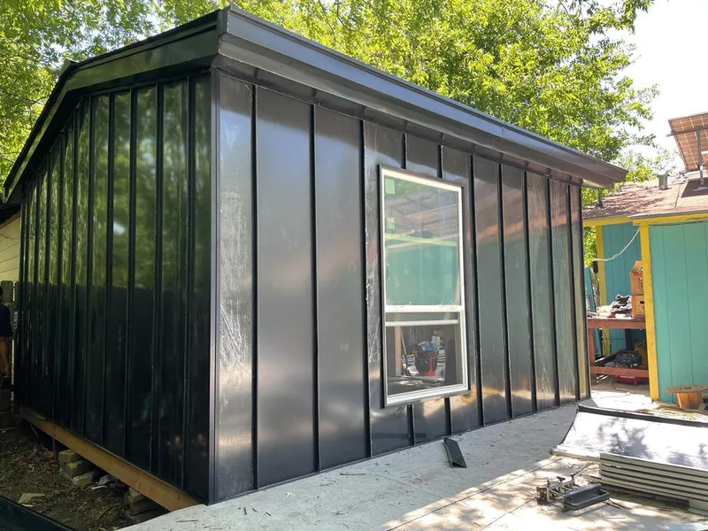 Black standing seam metal wall panels for Metal Roof Installation in Lee